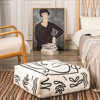 Pouf rond de sol Gaven