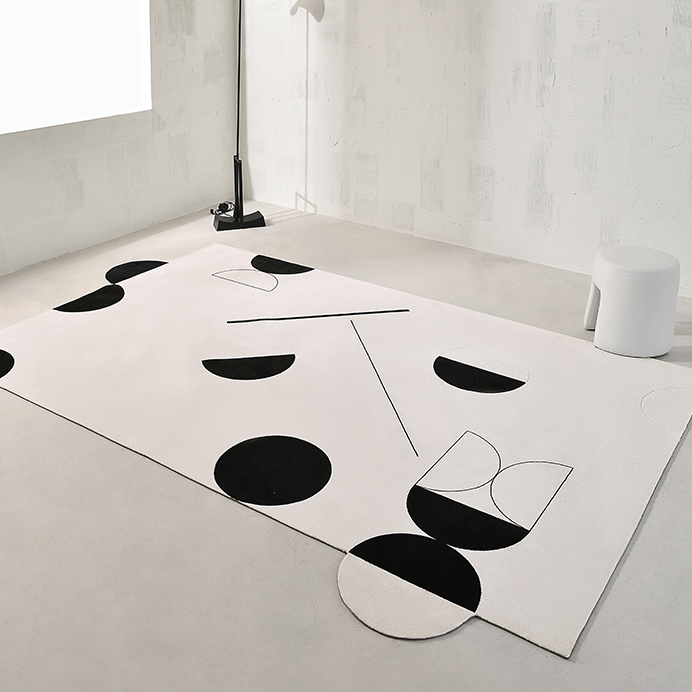 Tapis géométrique noir/blanc Avicia