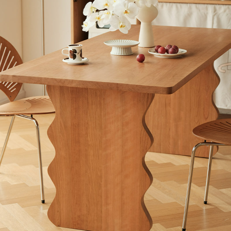 Table à manger à base ondulée Jalen