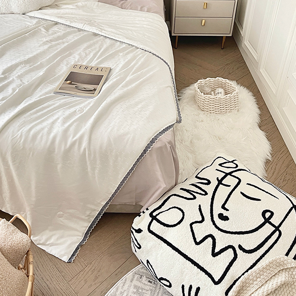 Pouf rond de sol Gaven