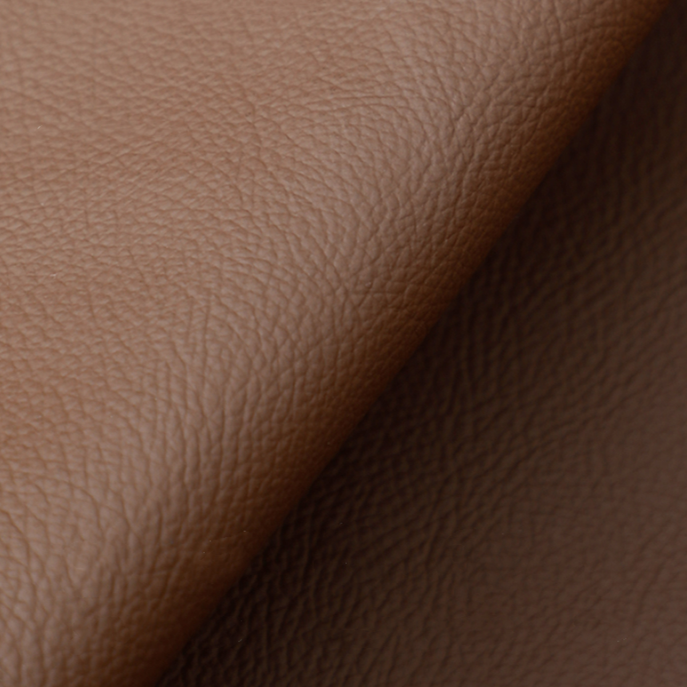 Oreiller en cuir artificiel aux tons de terre