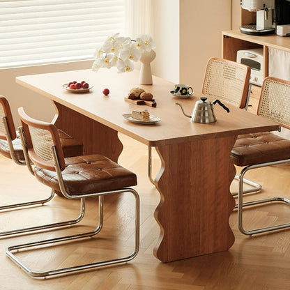 Table à manger à base ondulée Jalen