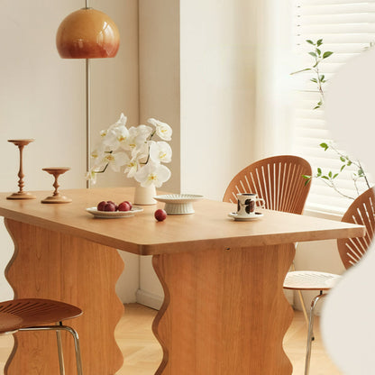 Table à manger à base ondulée Jalen