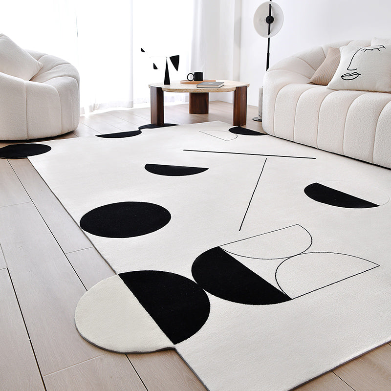 Tapis géométrique noir/blanc Avicia