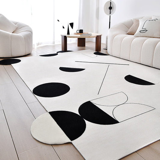 Tapis géométrique noir/blanc Avicia