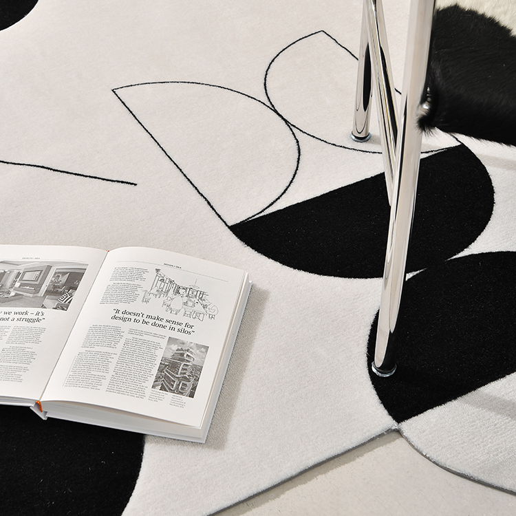 Tapis géométrique noir/blanc Avicia