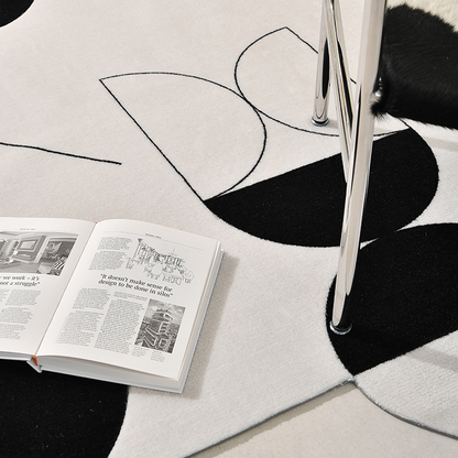 Tapis géométrique noir/blanc Avicia