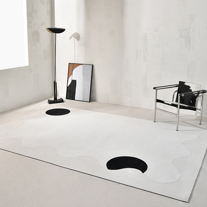 Tapis géométrique noir/blanc Avicia