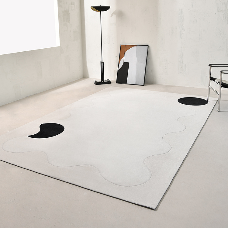 Tapis géométrique noir/blanc Avicia