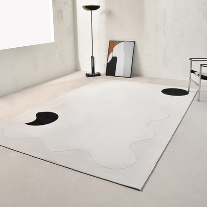 Tapis géométrique noir/blanc Avicia