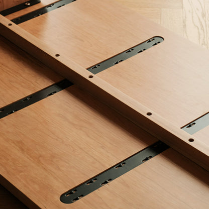 Table à manger à base ondulée Jalen